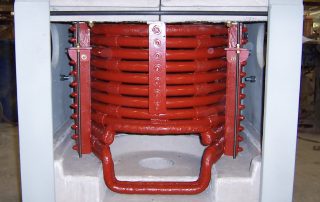 Induction melting coil in a furnace